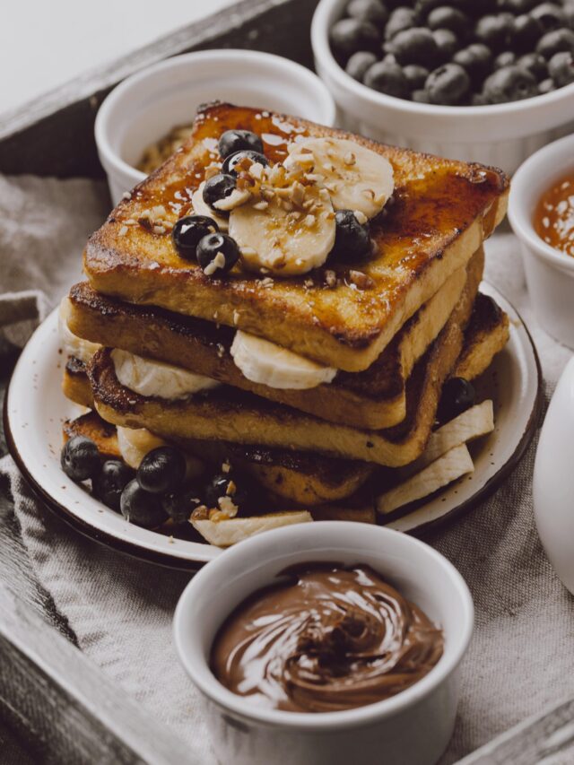 high-angle-breakfast-toast-with-banana-blueberries